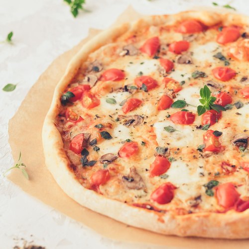 Recette Pâte à pizza maison et garniture au choix sur Chefclub daily